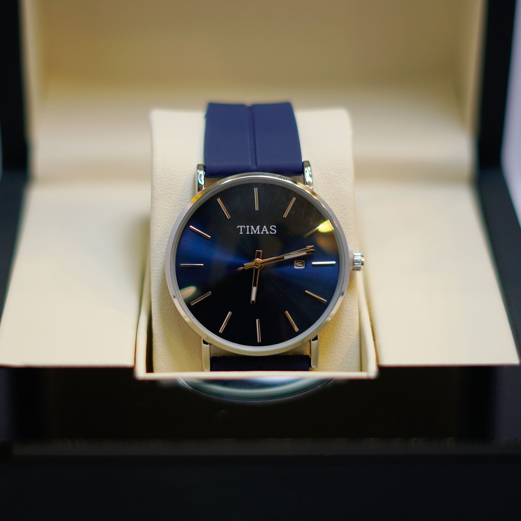 TIMAS Classic Blue Sunburst Dial Watch with Date Display