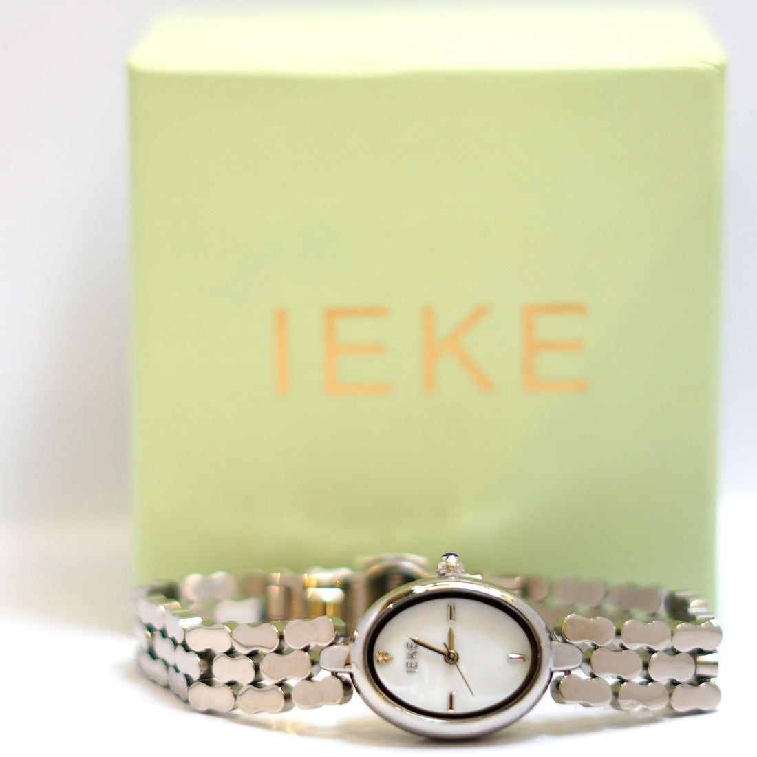 WEISIKAI Elegant Oval Ladies Watch with White Dial and Decorative Bracelet